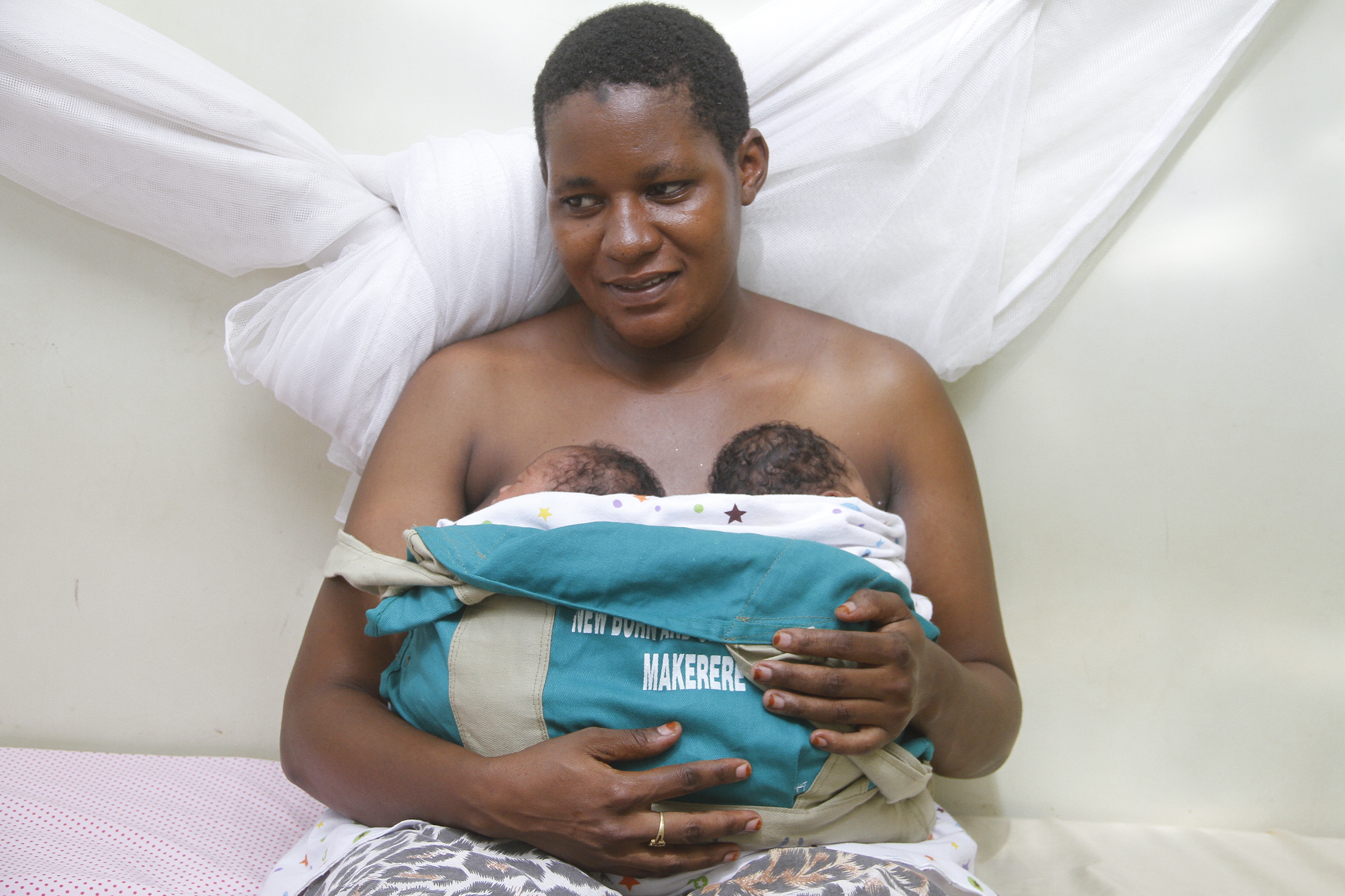 Uganda Mother with twins KMC