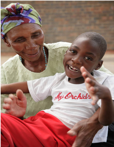 Woman with a small child in her lap